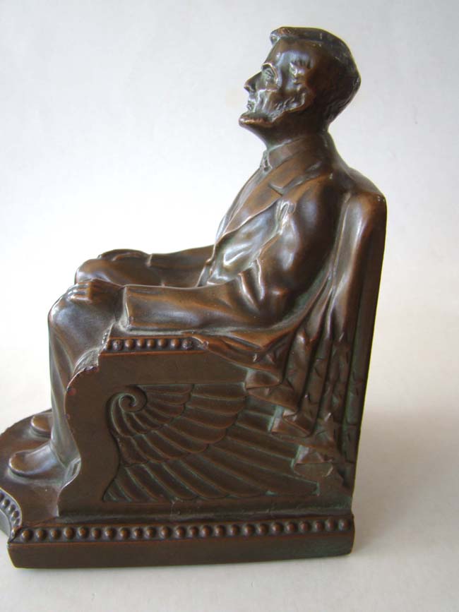 A pair of Lincoln in the chair bookends by NUART circa 1924 — image 2